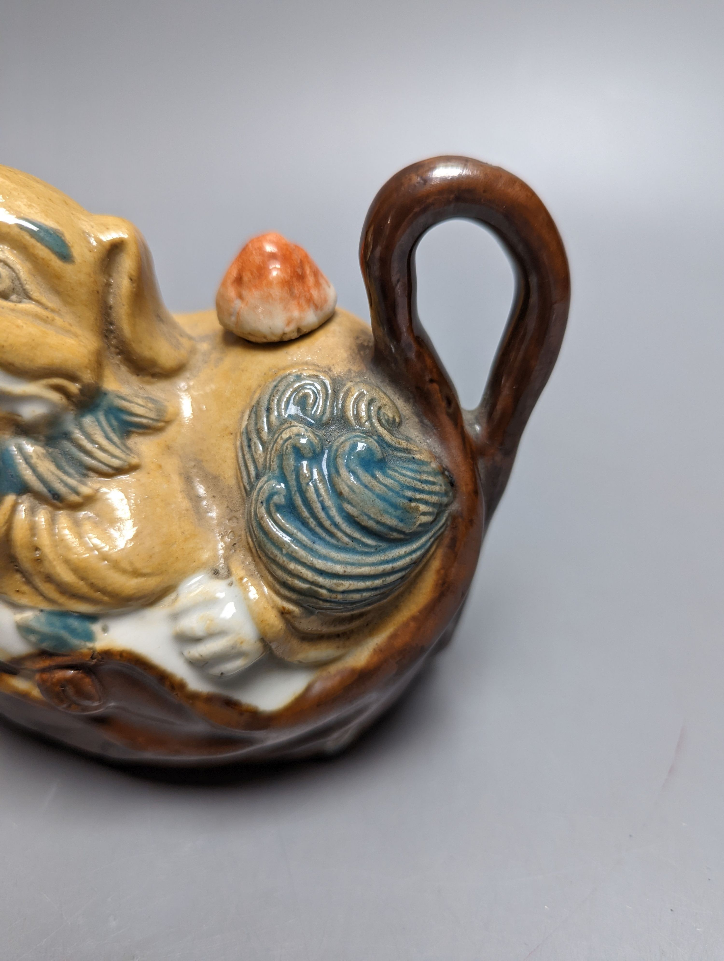 A Chinese pottery Buddhist lion water dropper